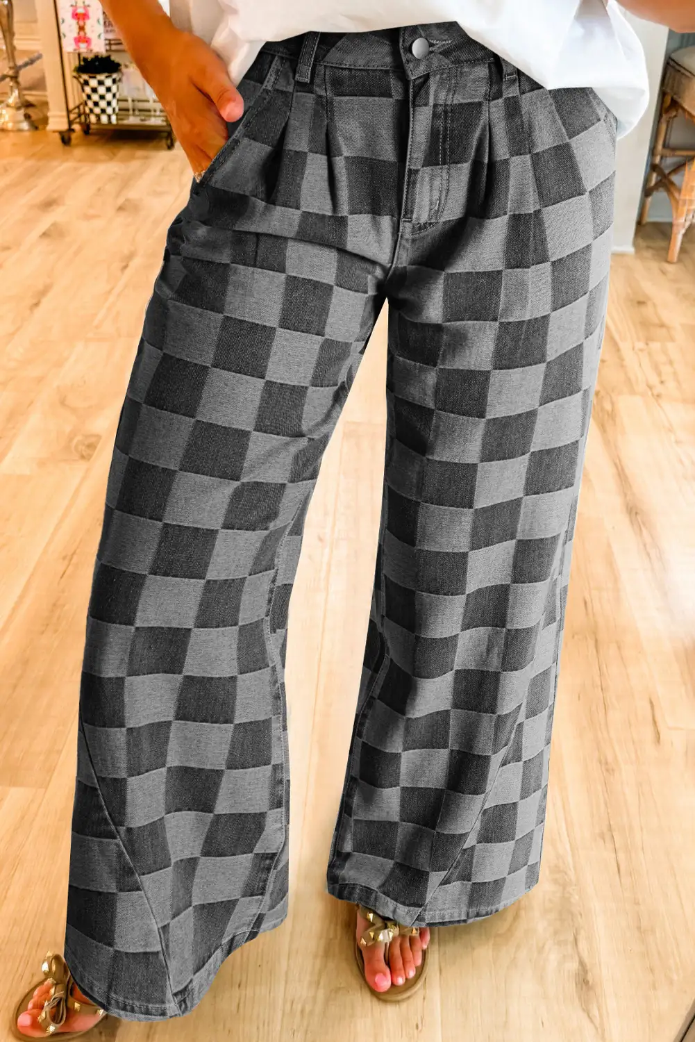 Catalog view of dark grey checkered wide-leg jeans front angle
