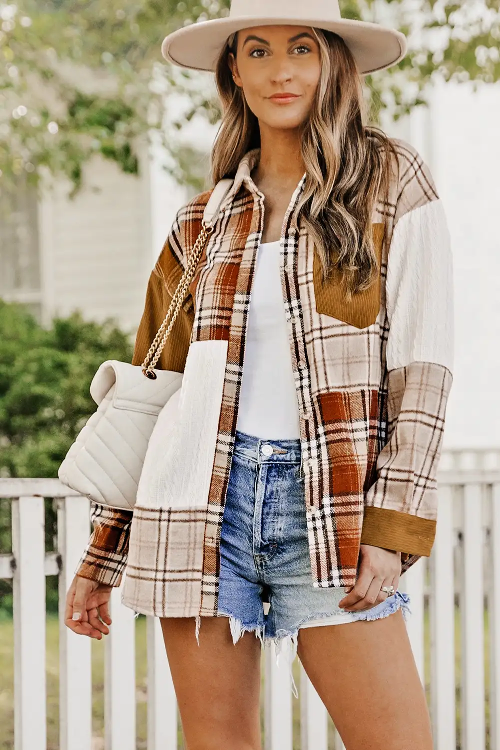 Orange color block jacket worn casually outdoors