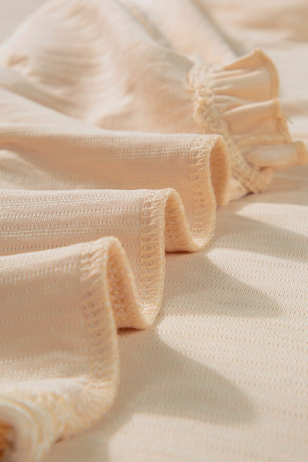 Light Pink Solid Textured Ruffled Short Sleeve Blouse - Image 42